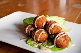 Sauerkraut balls with mustard sauce